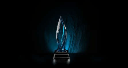 blue trophy on a dark background