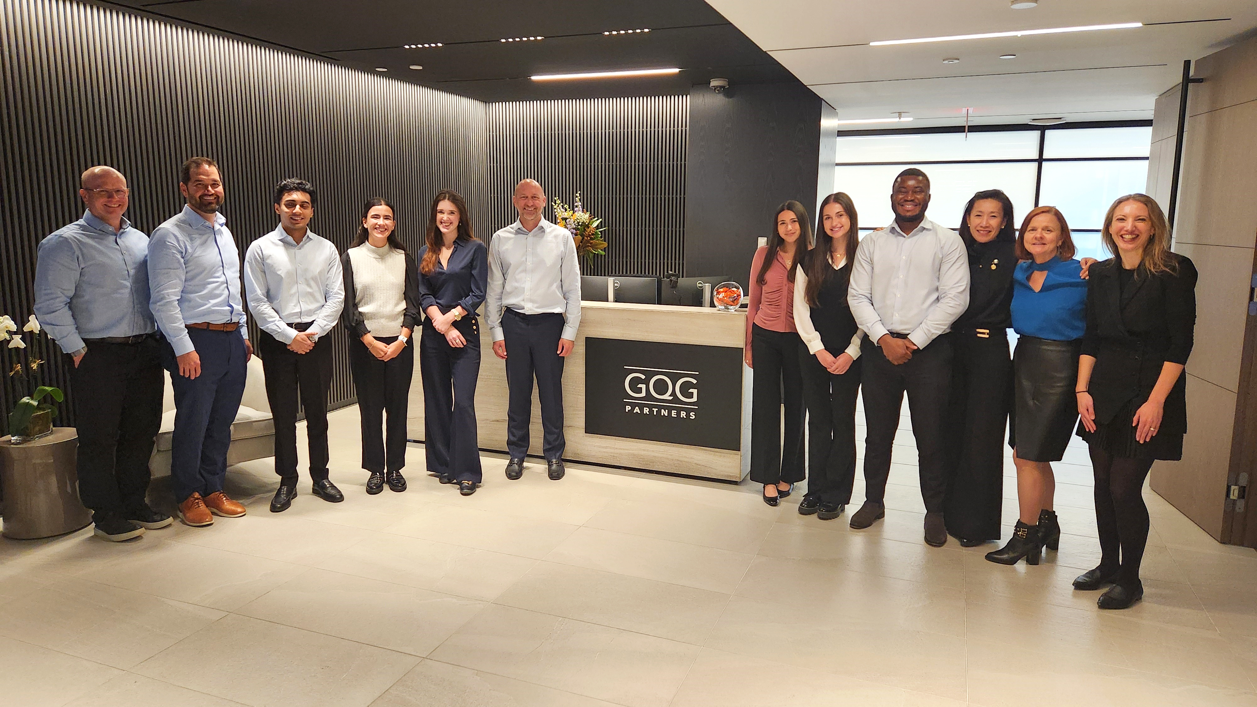 GQG New York Office — Tim Carver, CEO, pictured at the center of the group.