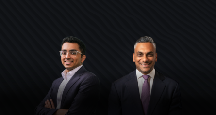 headshots of two men in suits on dark background